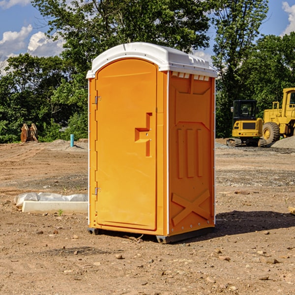 what is the cost difference between standard and deluxe portable restroom rentals in Goodrich TX